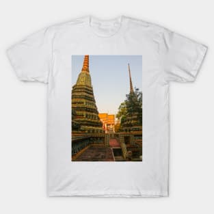 First sidewalk view to ornate roof, flanked from parts of Chedis at Wat Pho. T-Shirt